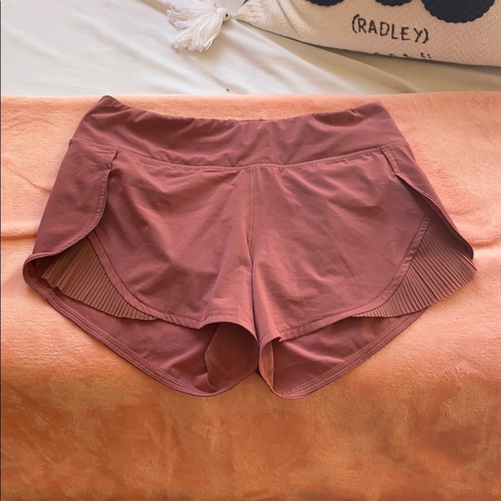 Mauve lululemon shorts with curtain detailing